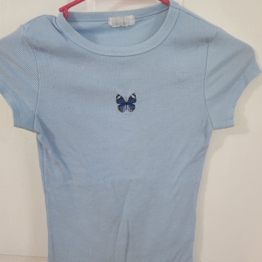 Blue shirt with butterfly